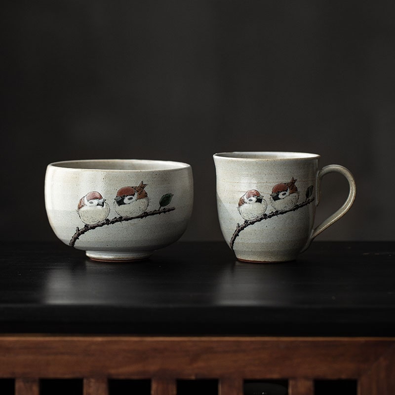 Japanese ceramic cup with delicate sparrow illustrations