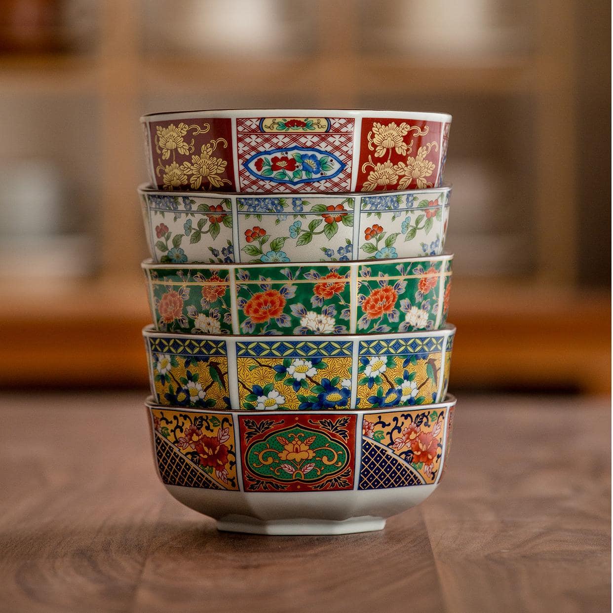 Decorative Japanese soup bowls stacked in a wooden gift box.