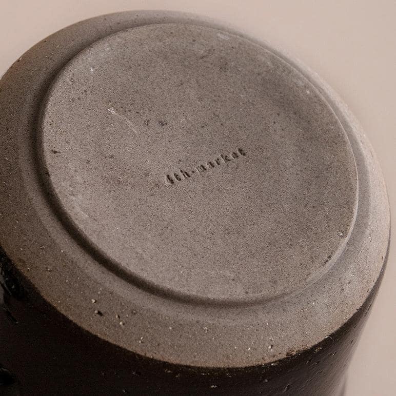 Durable ceramic pot for cooking and serving.