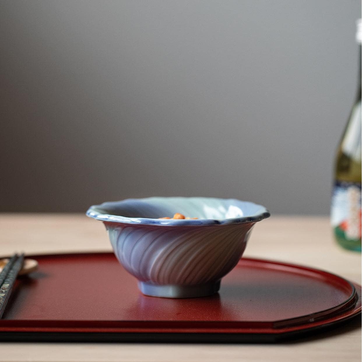 Artistic Japanese ceramic bowl for rice, fruit, and everyday dining.