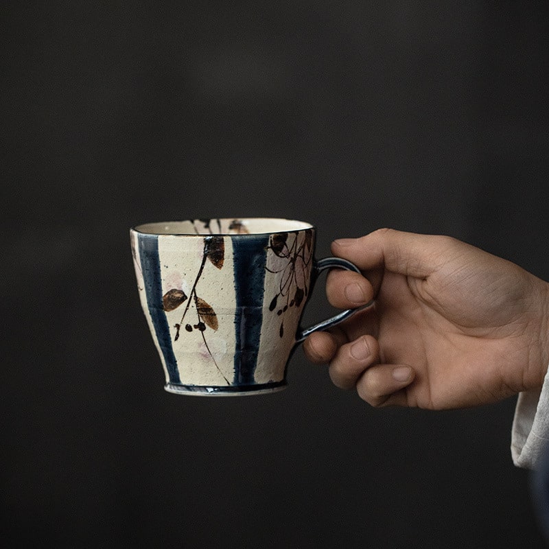 Blue and green striped ceramic mugs for tea and coffee