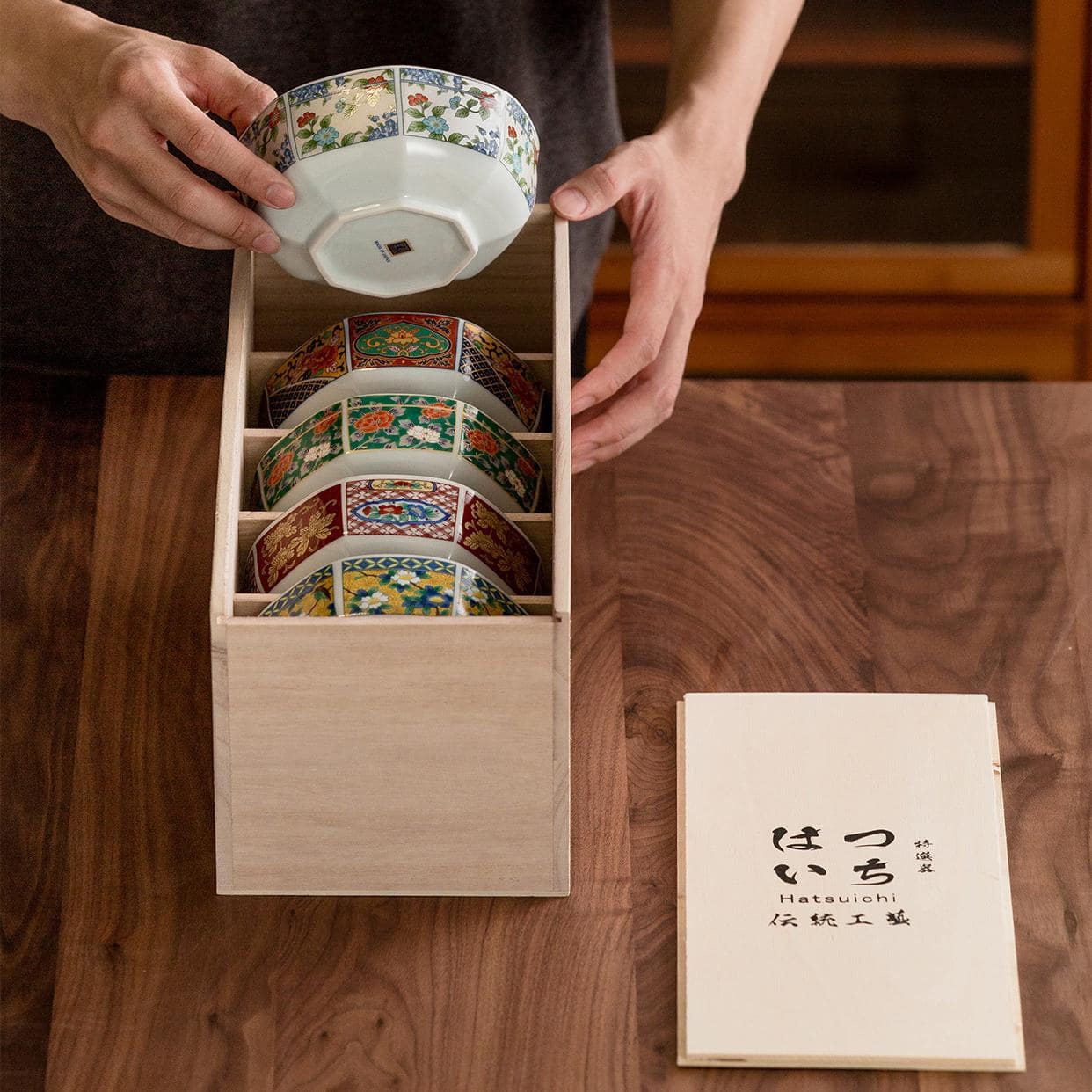 Traditional Japanese soup bowl with floral and geometric patterns.