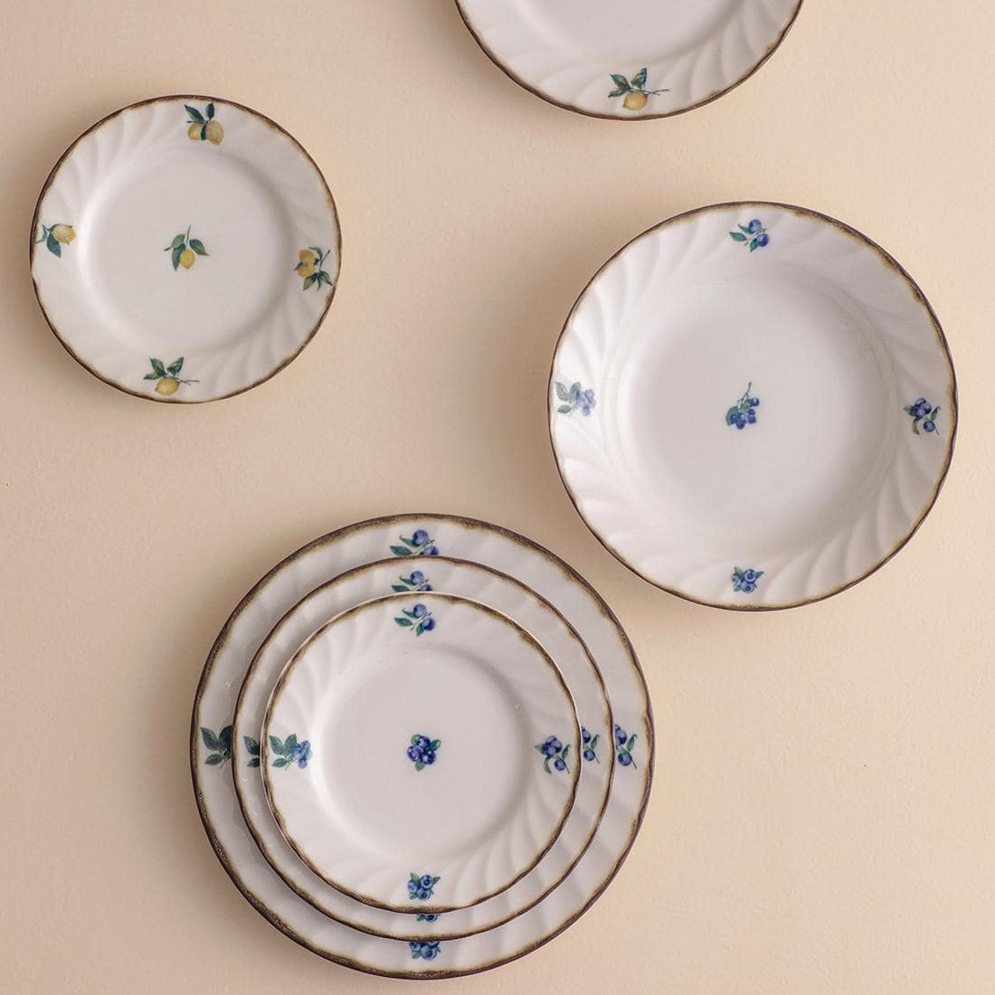 Full collection of Japanese handmade underglaze lemon ceramic plates.