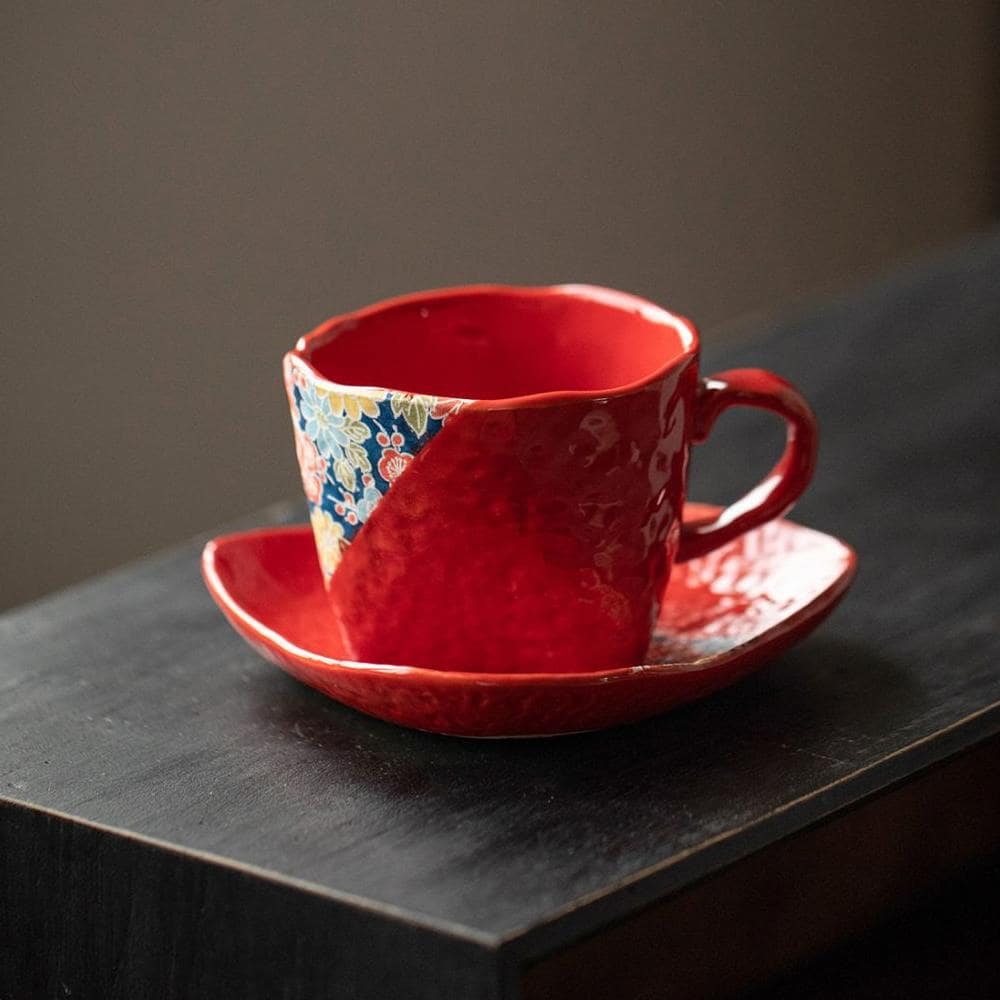 Japanese red Mino ware ceramic coffee mug with floral design