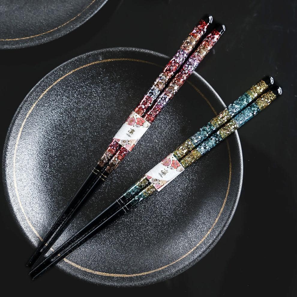 Japanese-inspired artistic chopsticks with intricate patterns.