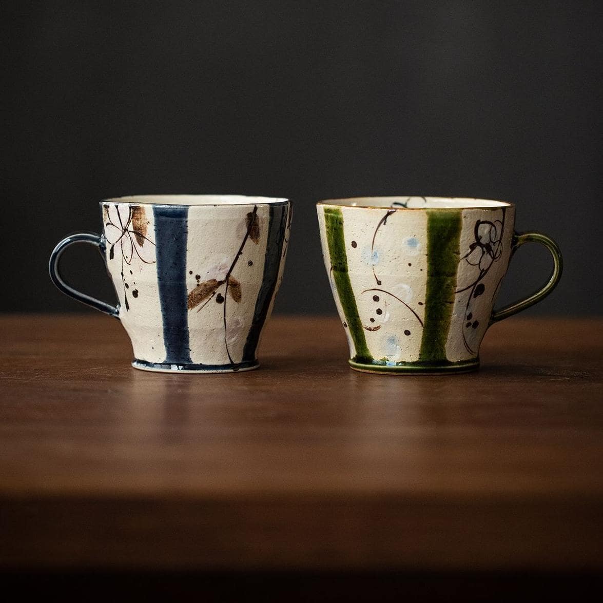 Handcrafted artisan teacup set with floral and vine patterns