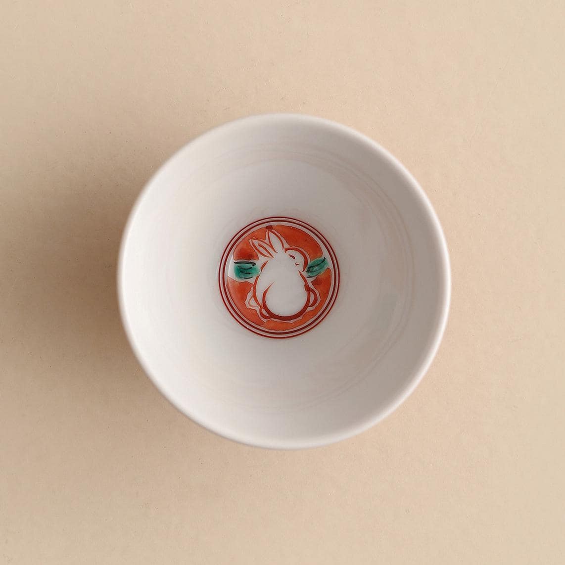 Elegant Rabbit Design Porcelain Teacup Set on wooden table