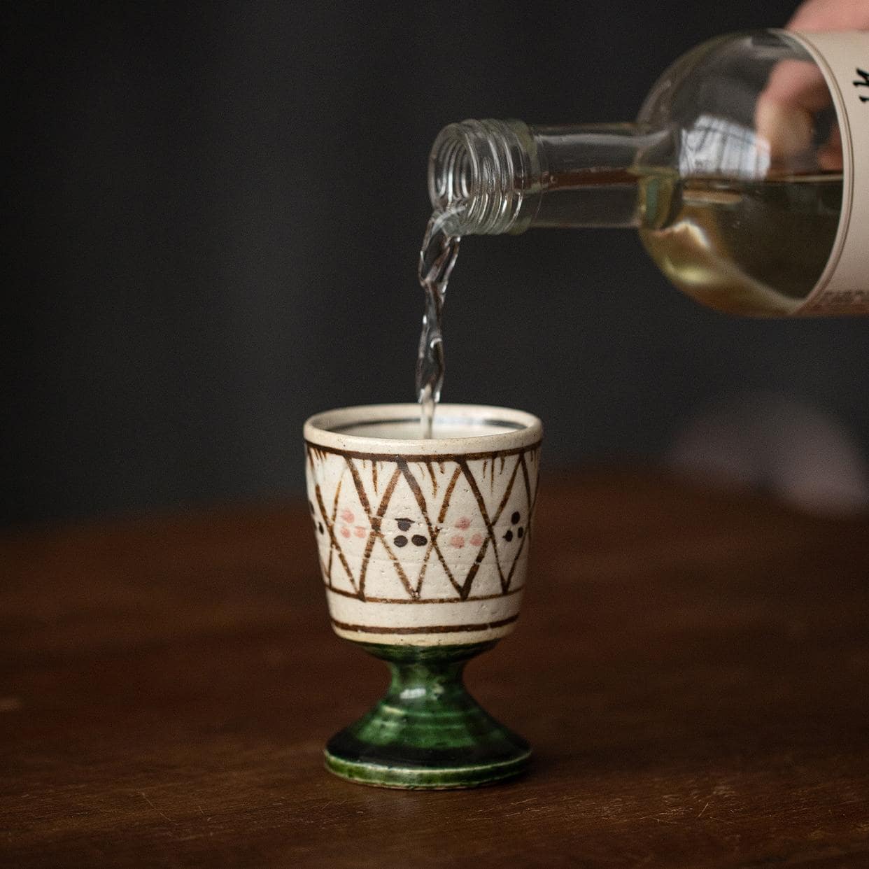 Pair of handcrafted ceramic cups with intricate designs