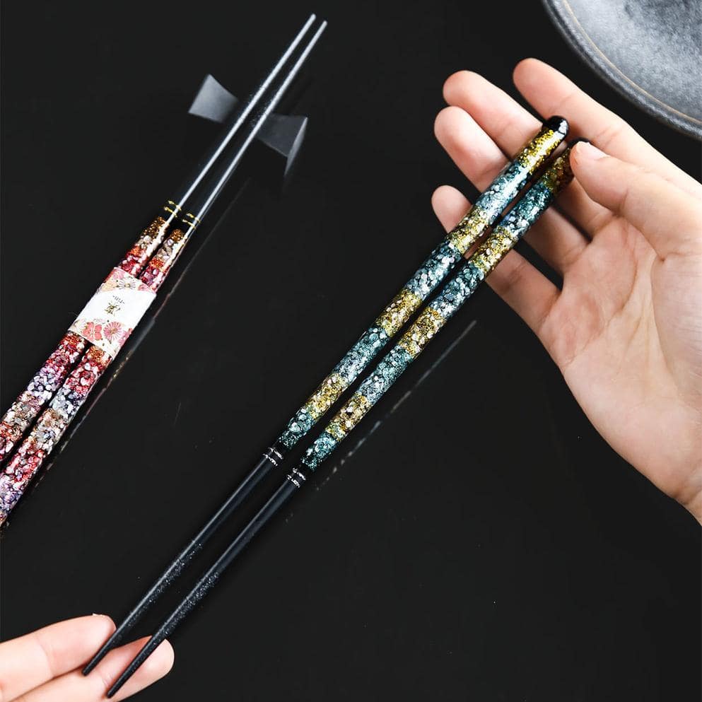 Japanese-inspired artistic chopsticks with intricate patterns.