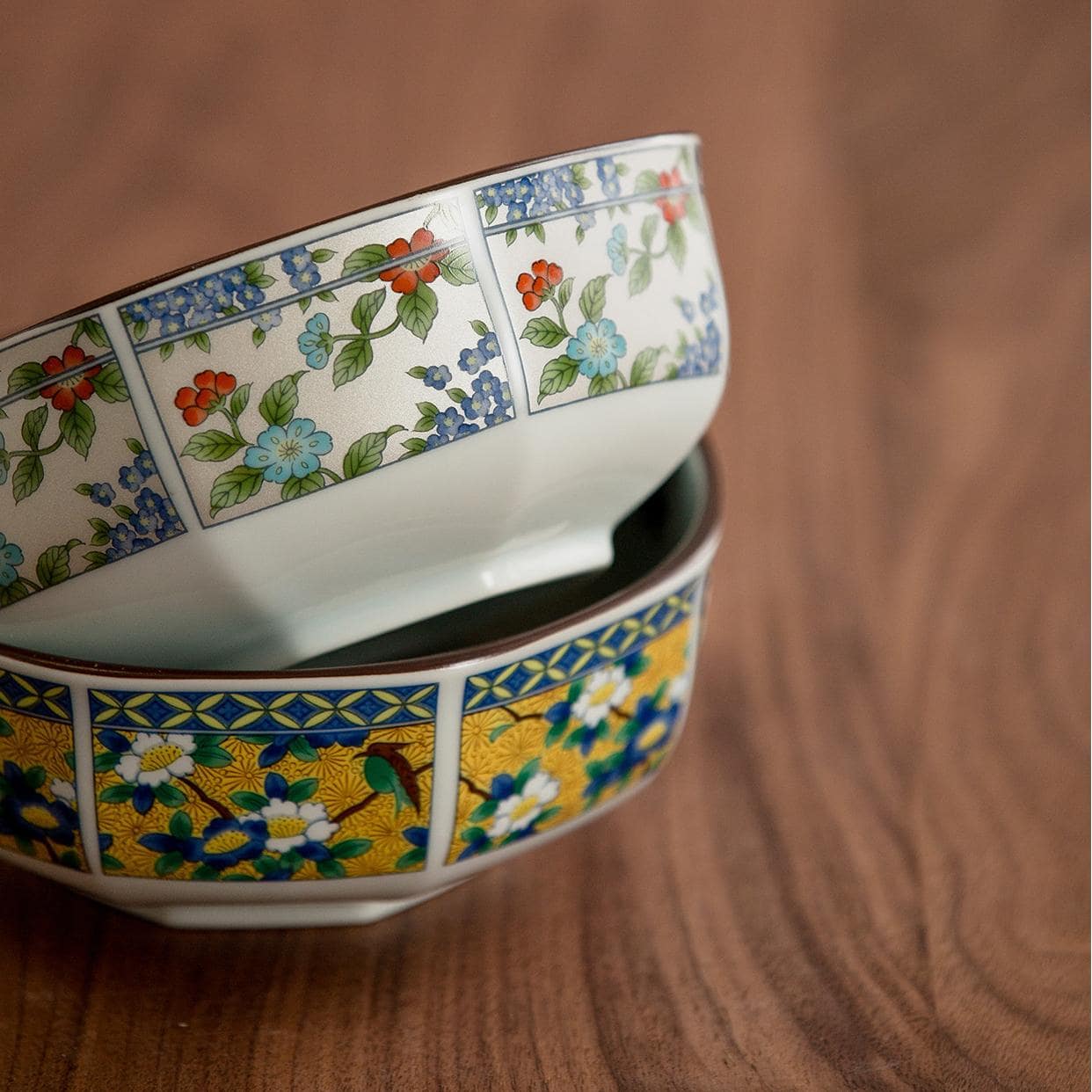 Decorative Japanese soup bowls stacked in a wooden gift box.