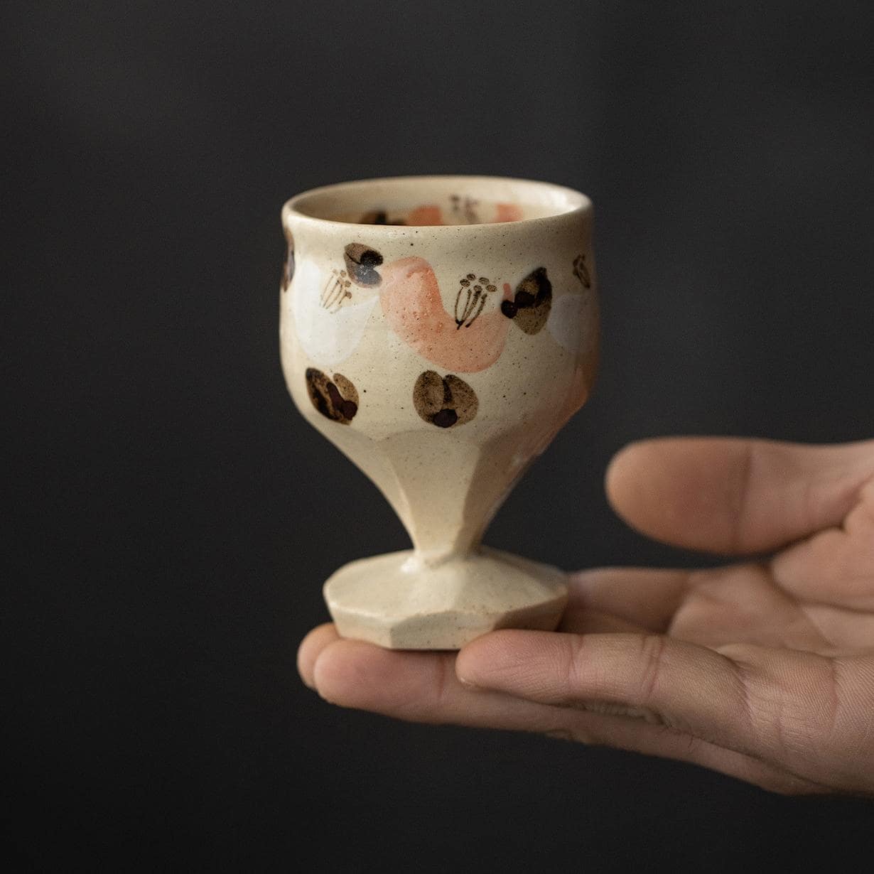 Ceramic cups set on a table, perfect for tea or wine