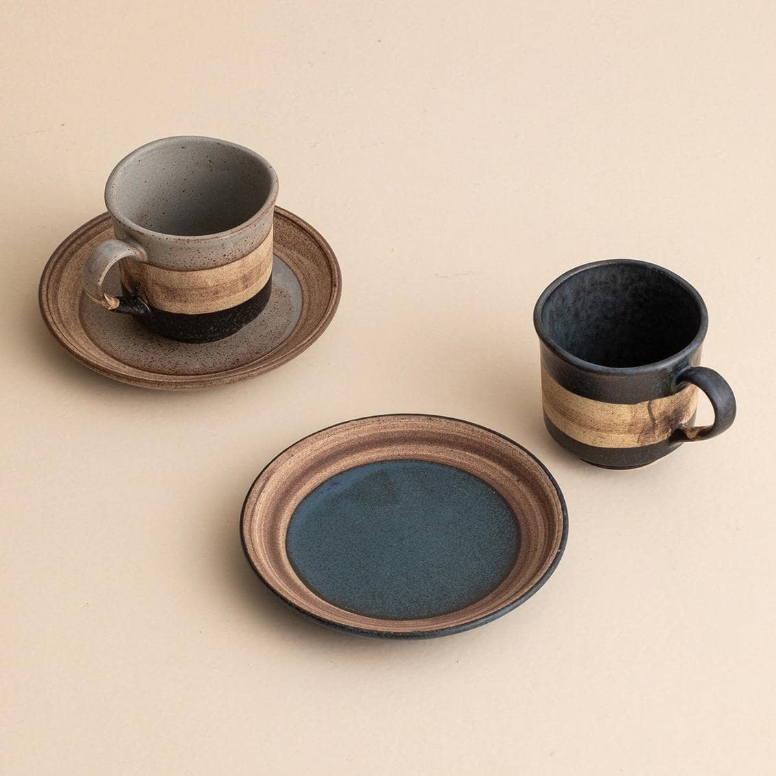 Modern rustic ceramic cup for cozy beverage moments.