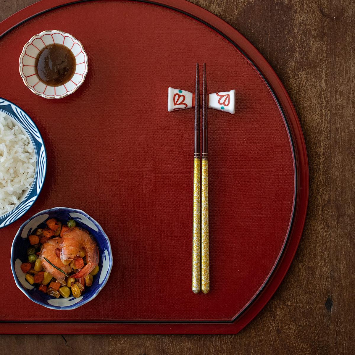 Elegant Japanese tableware chopsticks with vibrant designs.