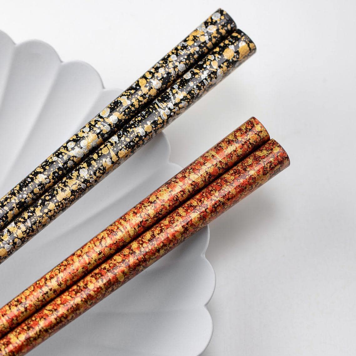 Decorative close-up of chopstick ends showcasing speckled design