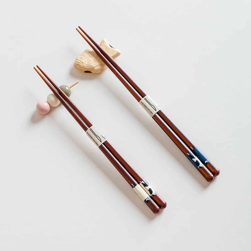 Set of decorative wooden chopsticks with cute motifs