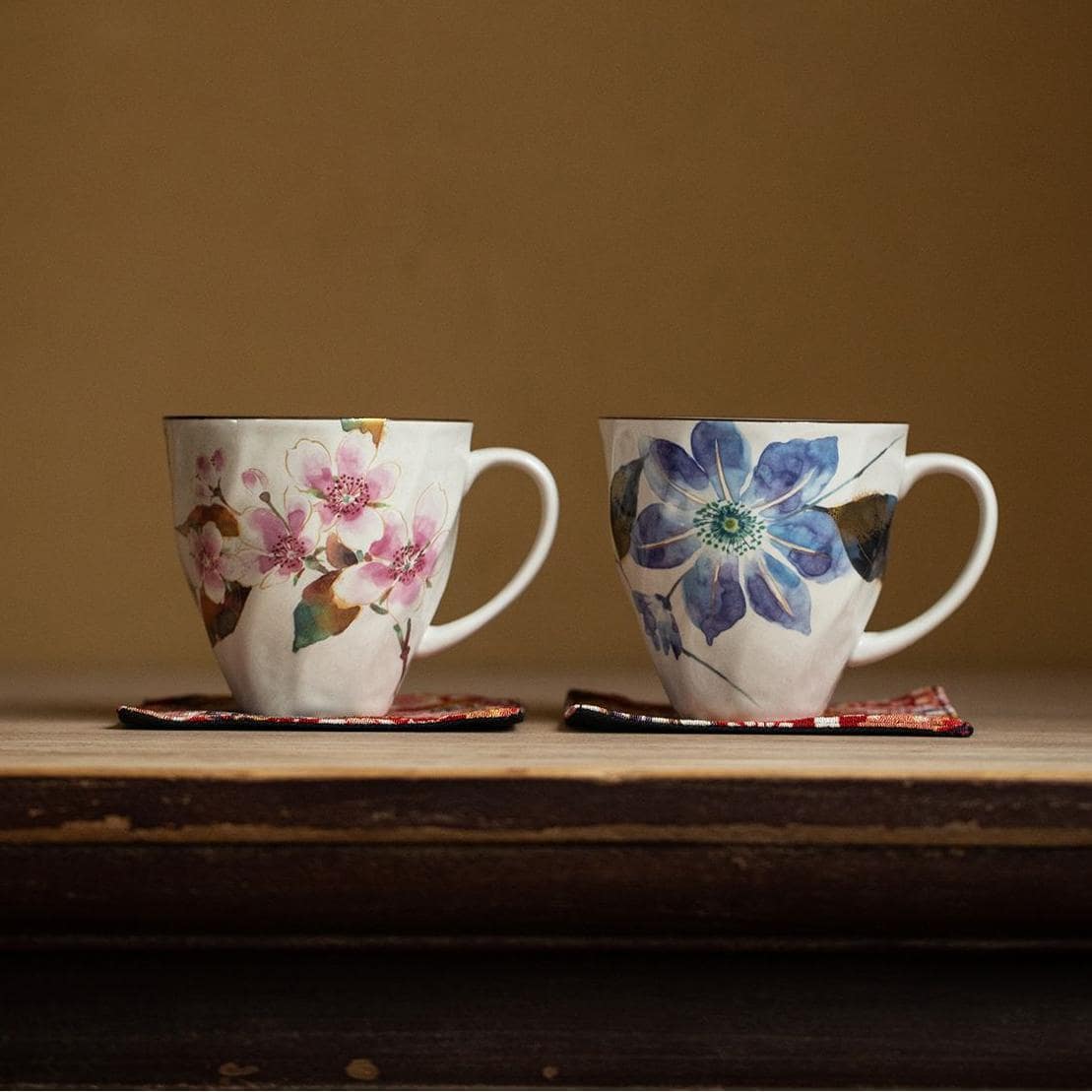 Elegant tea cup set with colorful flower designs