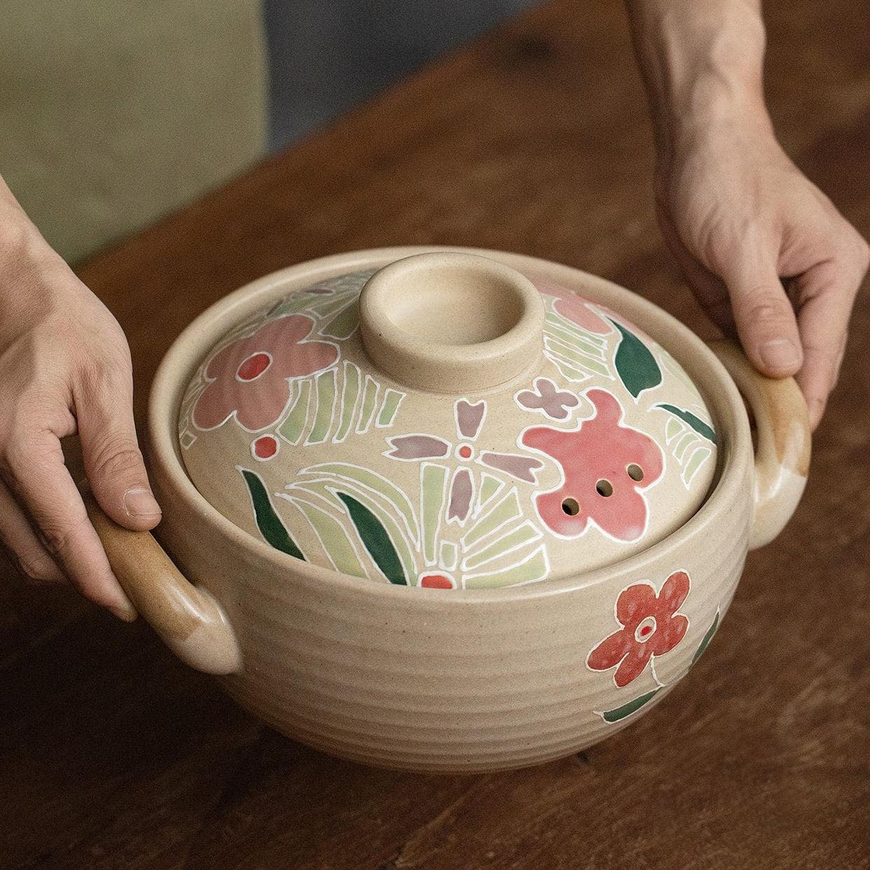 Artisan ceramic casserole dish filled with seafood stew