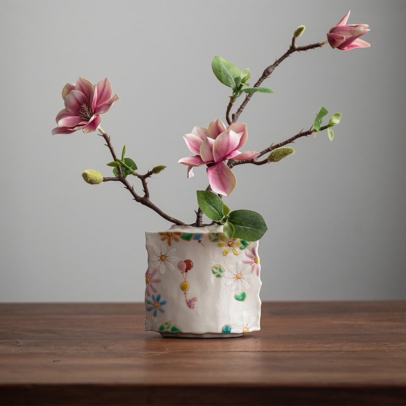 Whimsical hand-painted floral ceramic cups