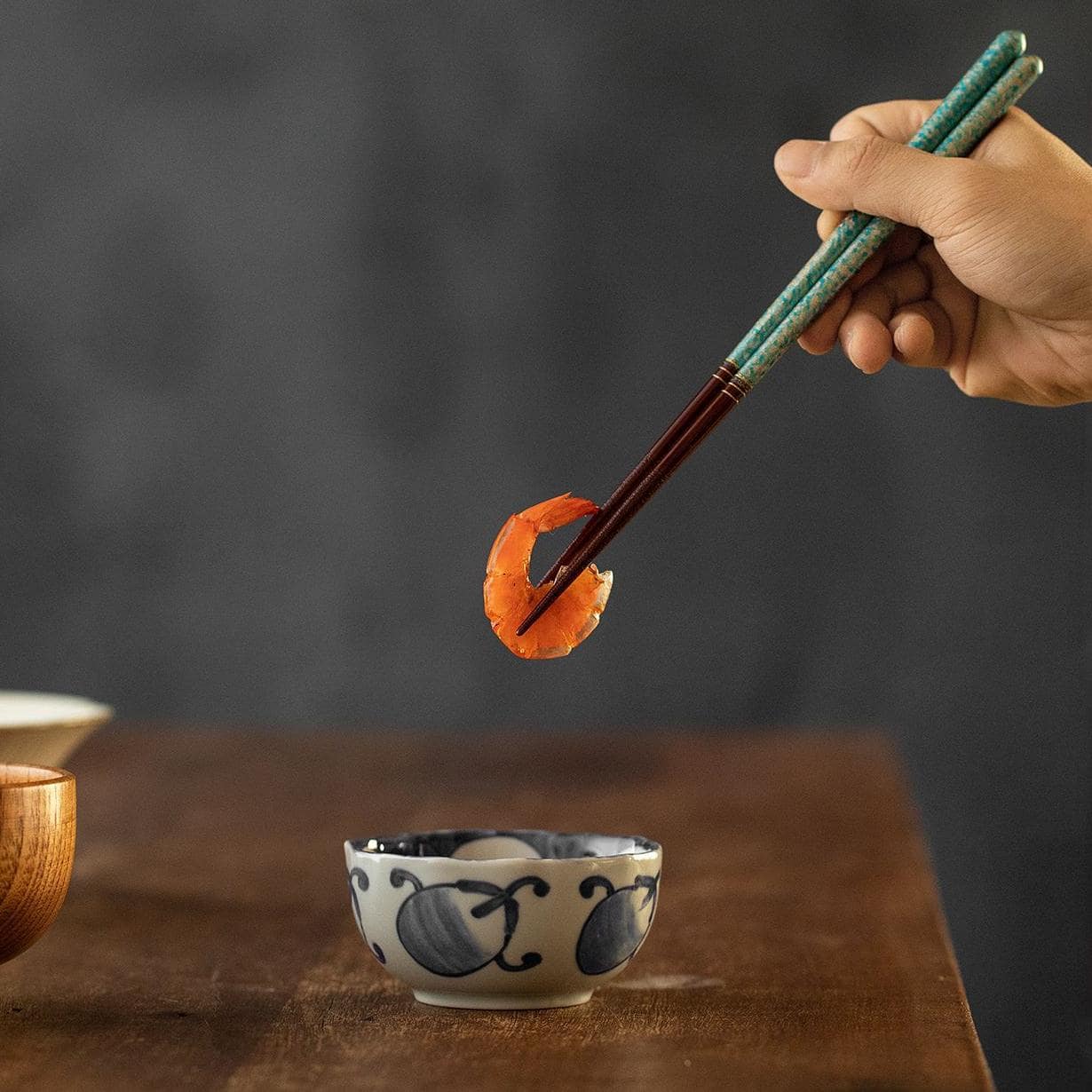 Elegant Japanese tableware chopsticks with vibrant designs.