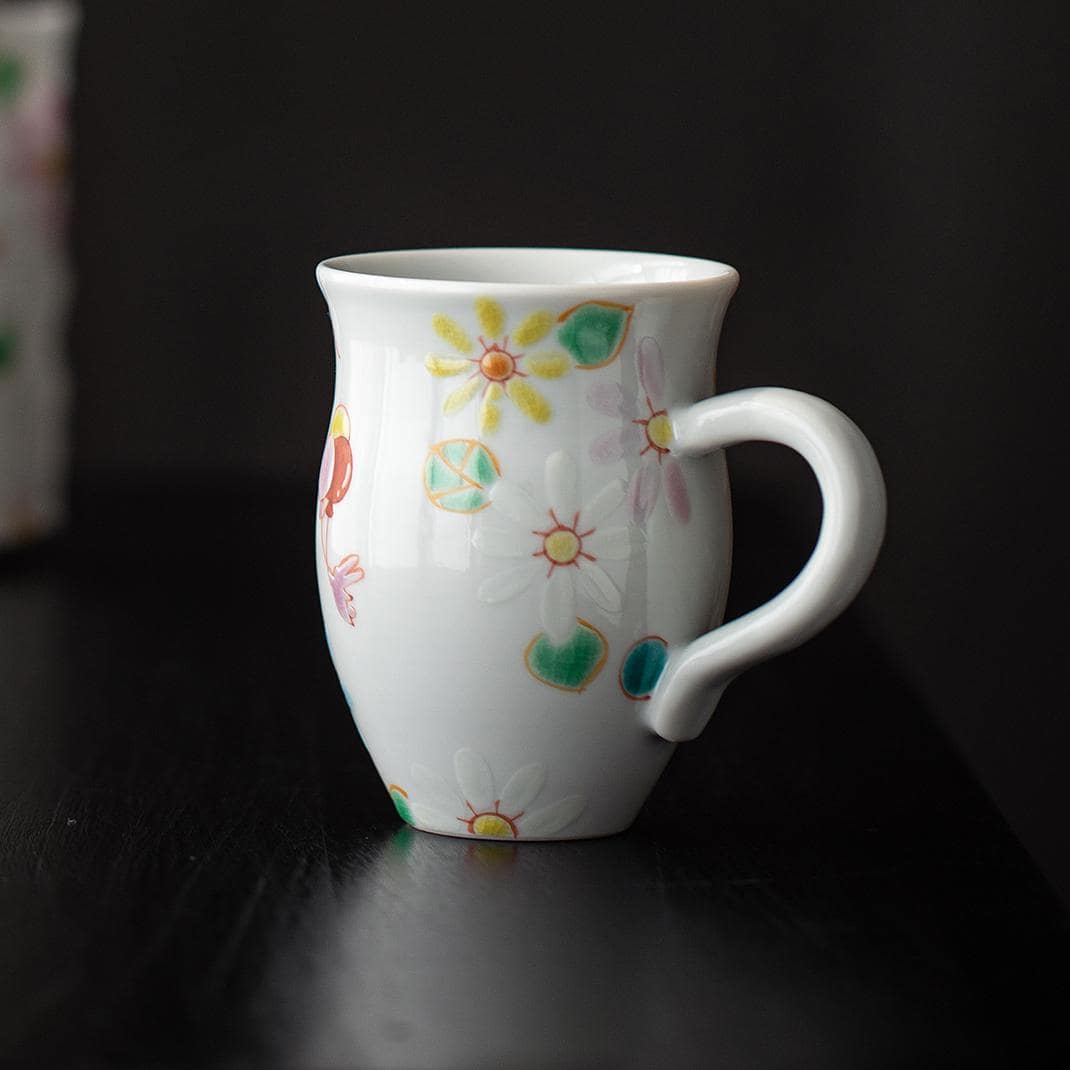 Decorative floral teapot and ceramic cups