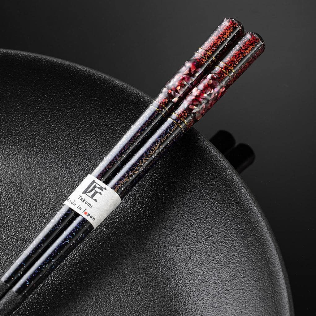 Durable Japanese chopsticks with intricate lacquer finish.