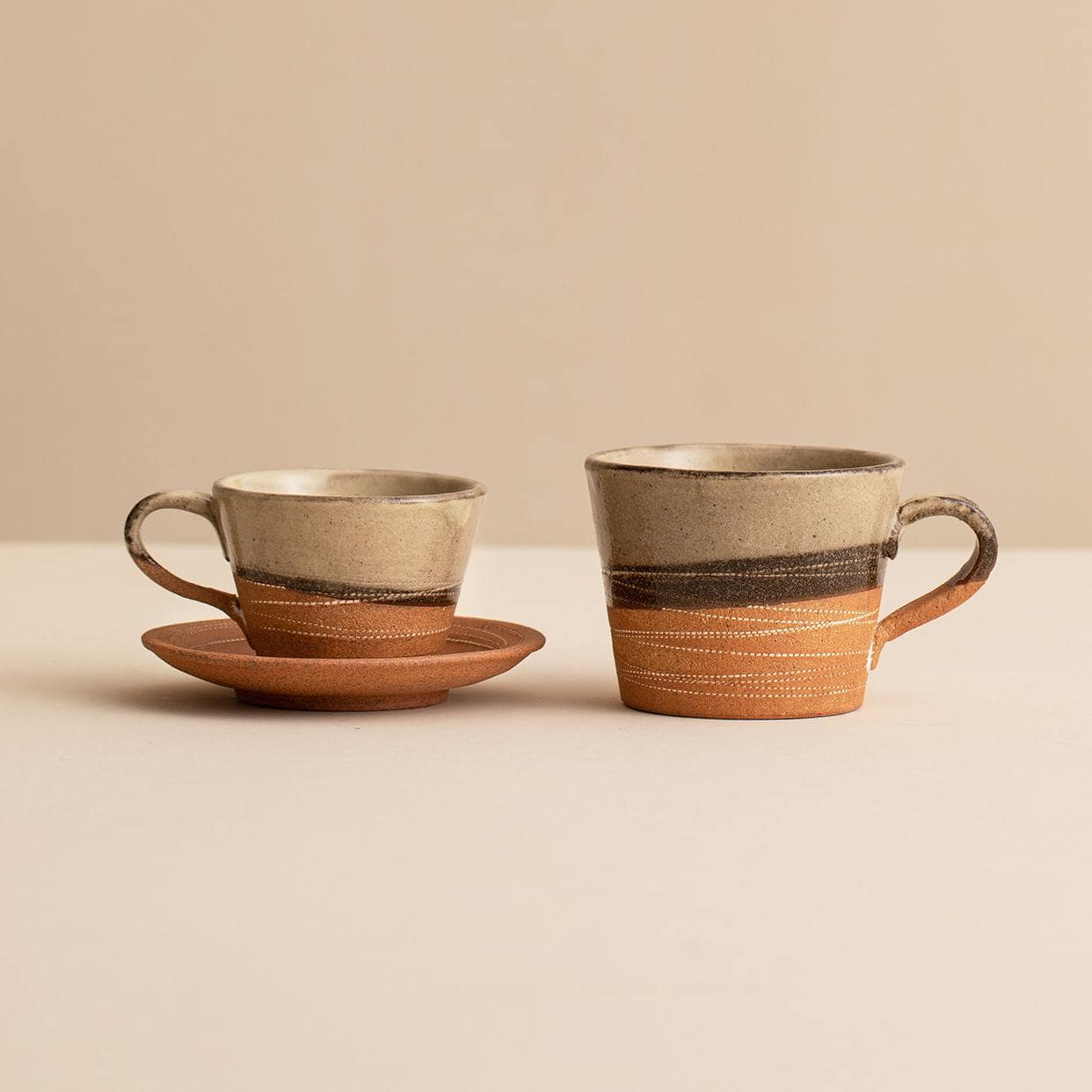 Durable handcrafted ceramic tea cup with rustic charm.