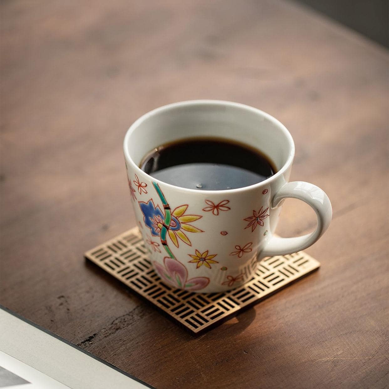 Whimsical hand-painted floral ceramic cups