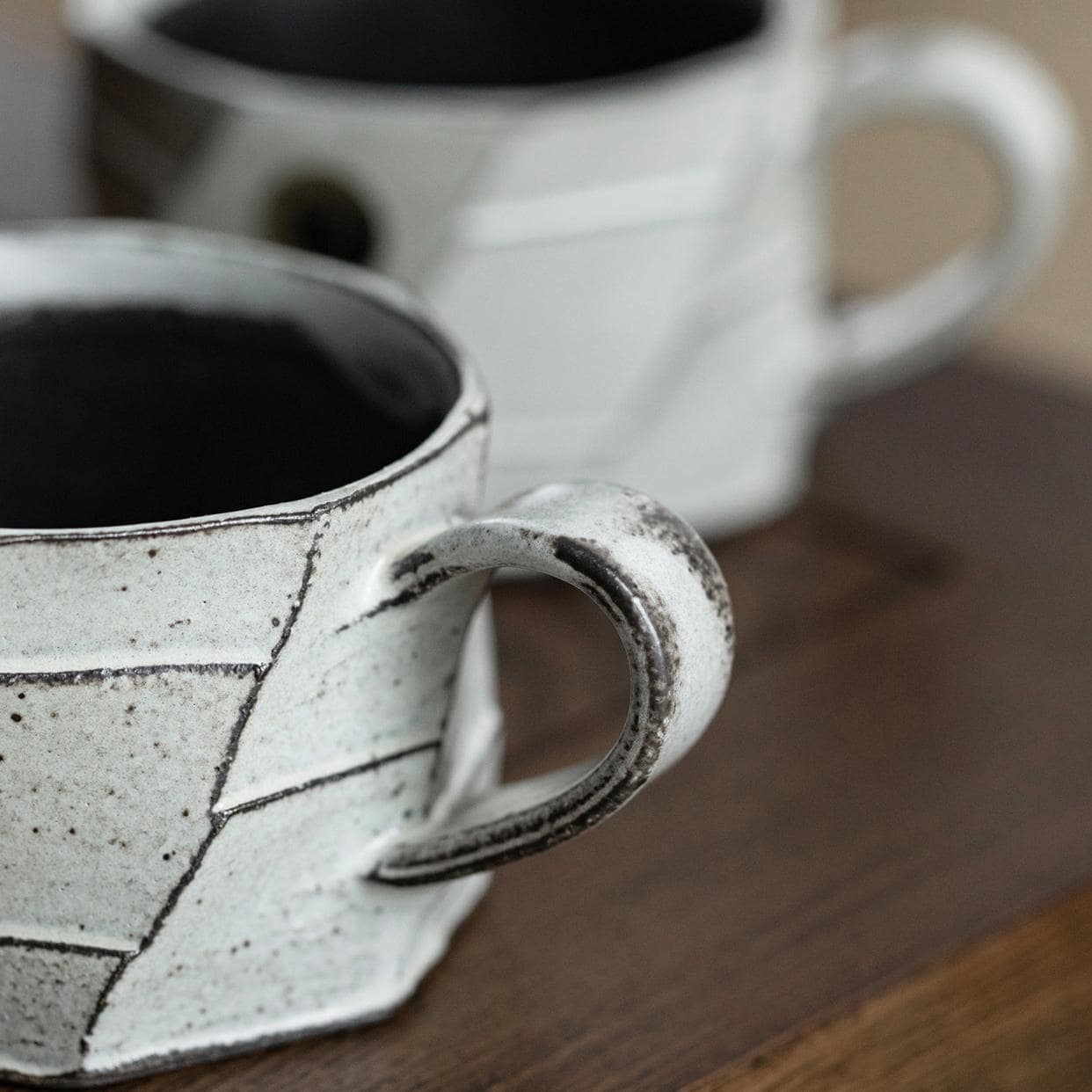 Eco-friendly artisan ceramic mug in stylish packaging