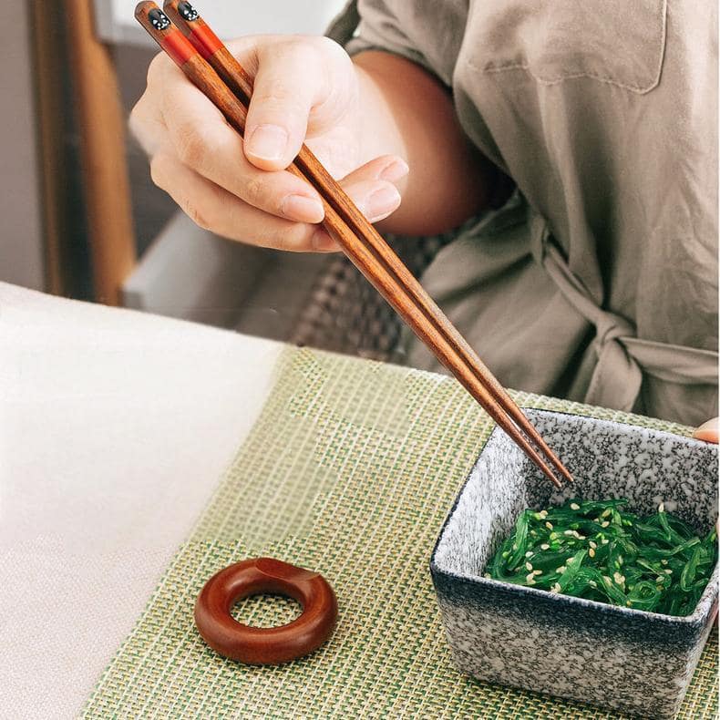 Durable and lightweight animal-themed chopsticks displayed on a plate