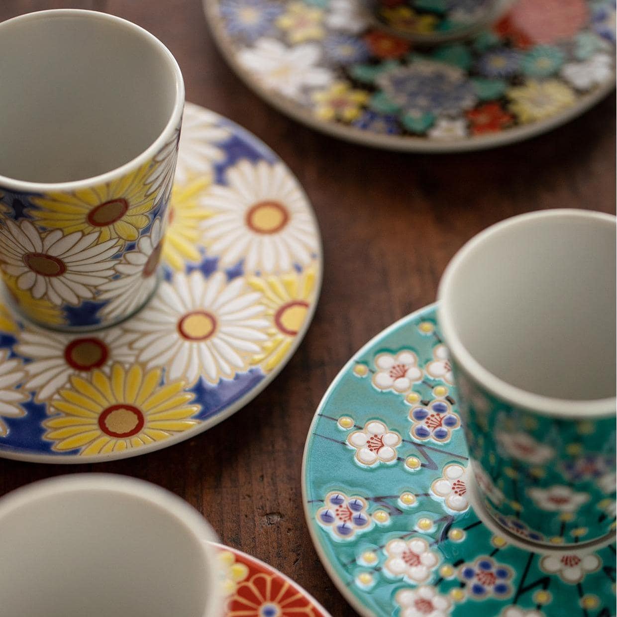 Close-up of porcelain espresso cup with daisy pattern