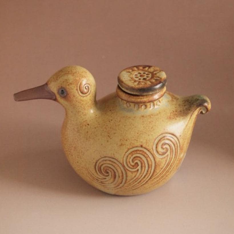 Whimsical ceramic bird oil pot used for soy sauce and oils.