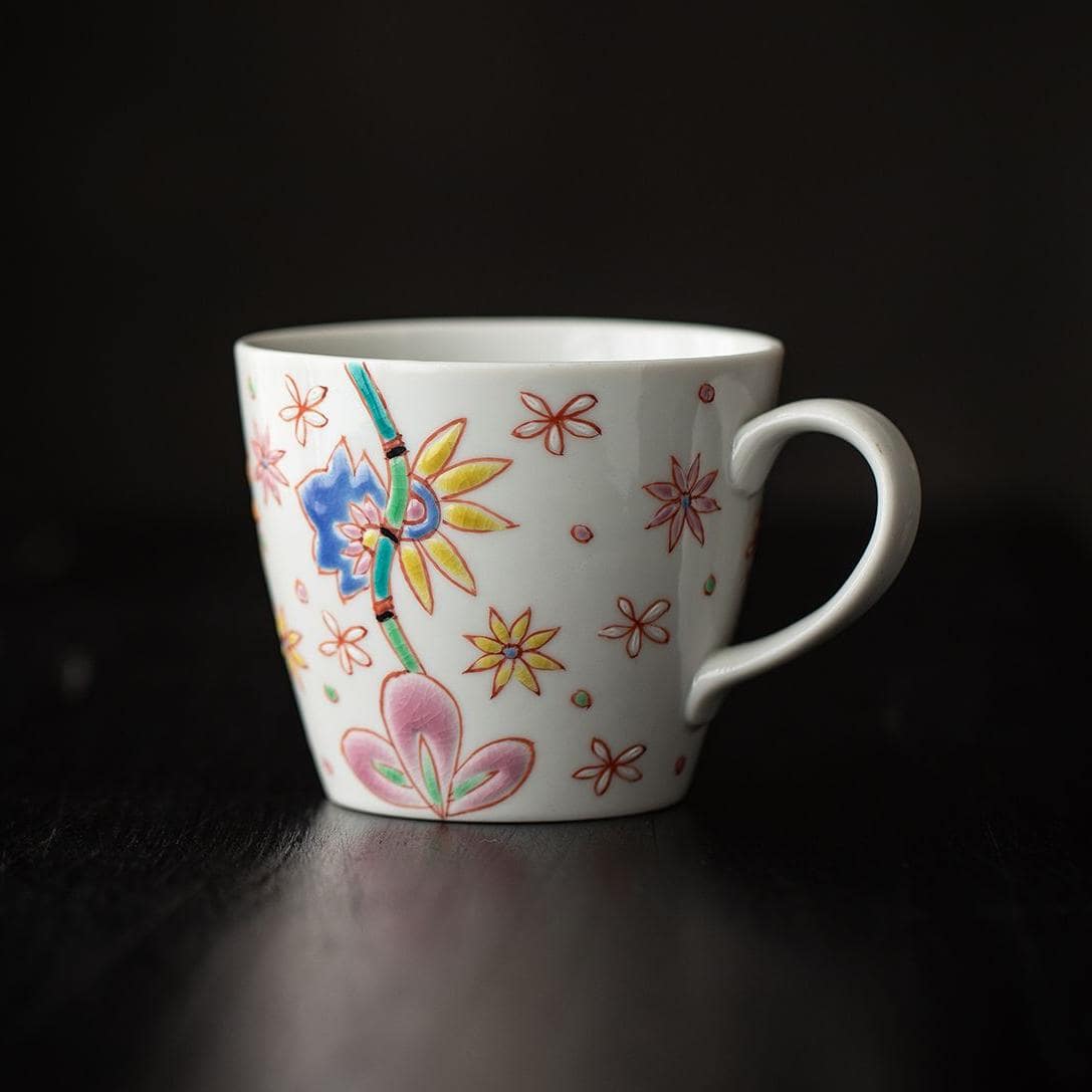 Decorative floral teapot and ceramic cups