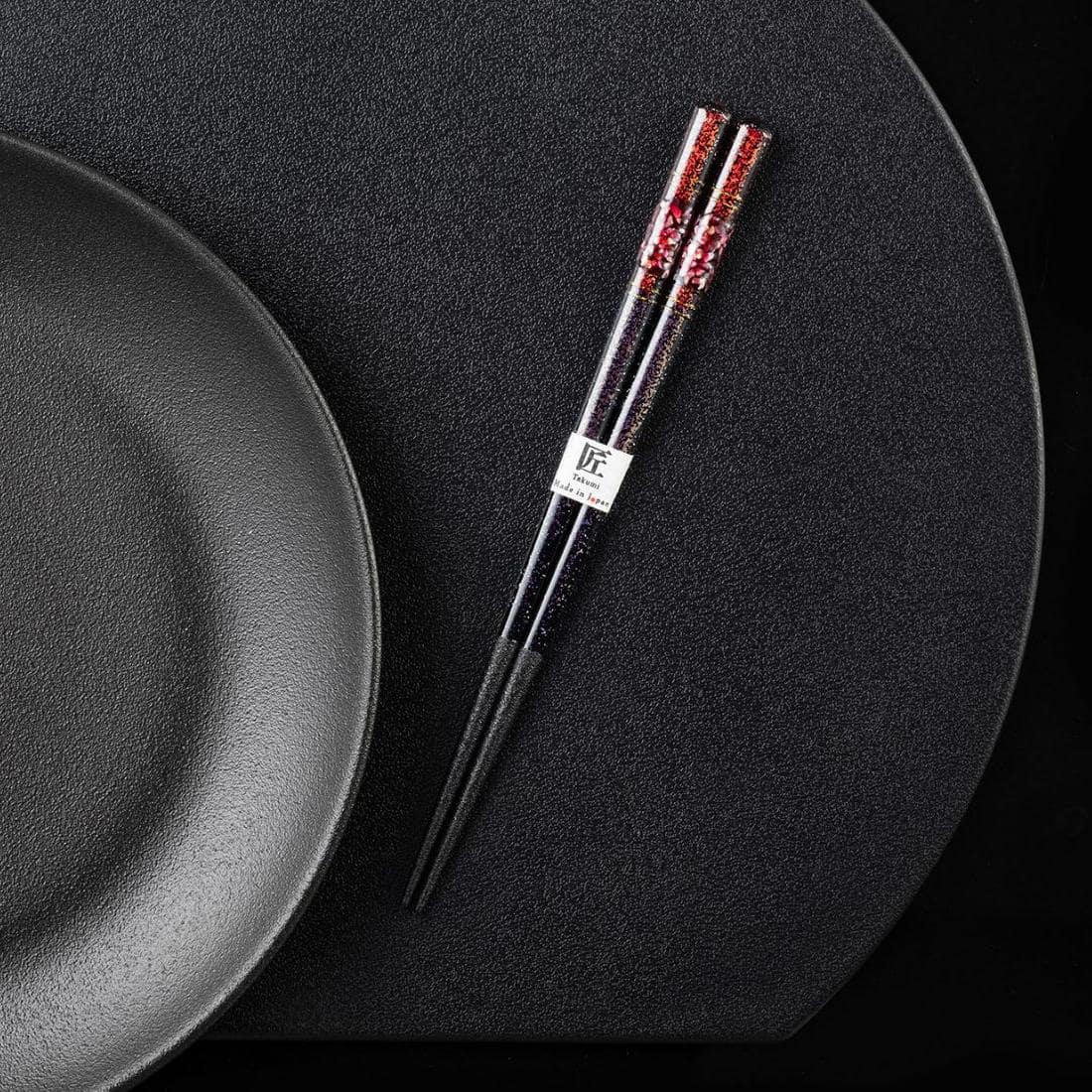 Durable Japanese chopsticks with intricate lacquer finish.