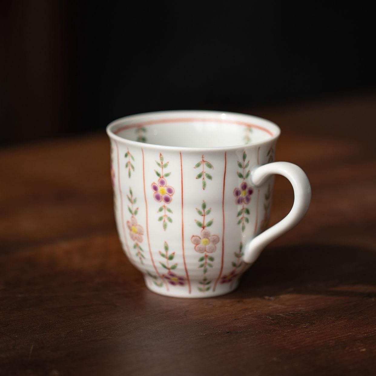 Artistic ceramic vase with hand-painted details