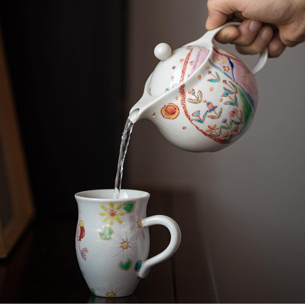 Whimsical hand-painted floral ceramic cups