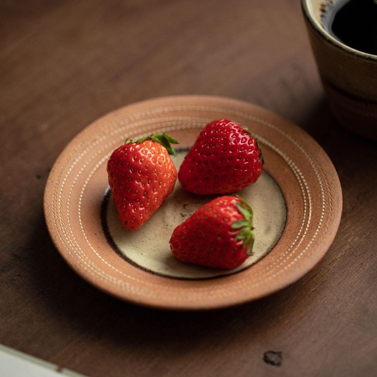 Durable handcrafted ceramic tea cup with rustic charm.