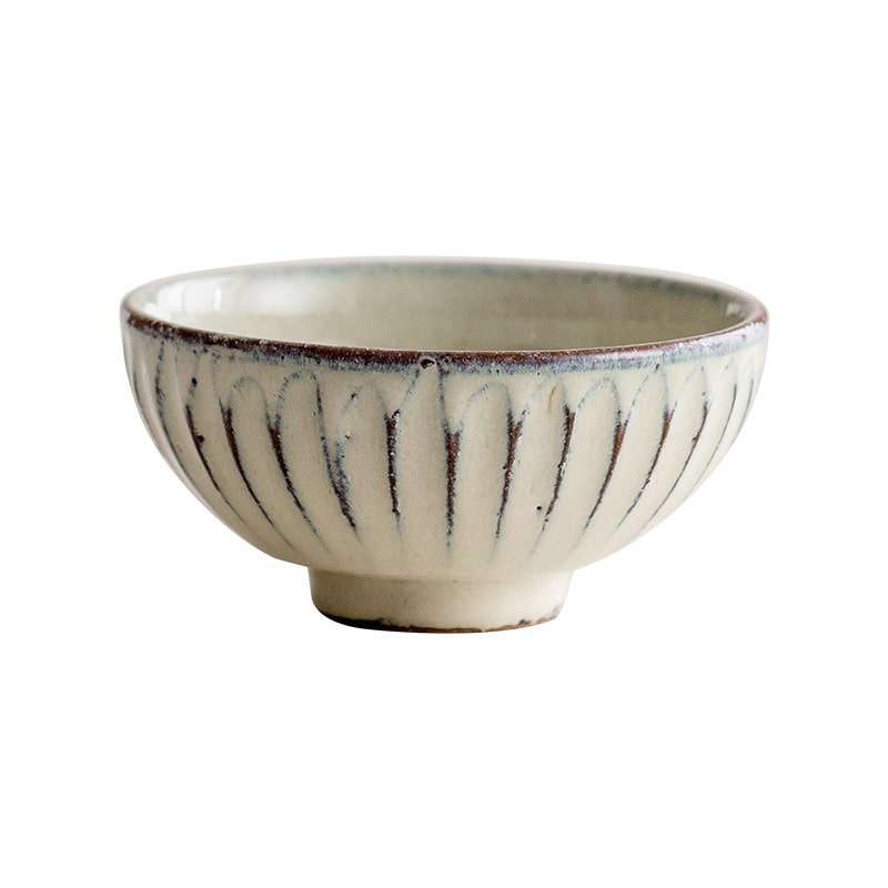 Eco-friendly ceramic bowls with timeless ribbed patterns