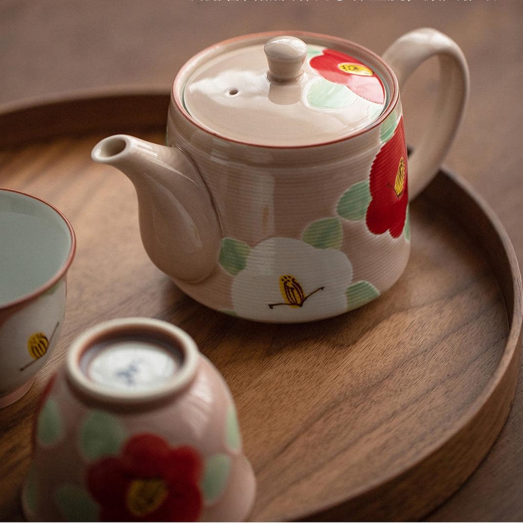 Traditional Japanese-style tea set in wooden box packaging.