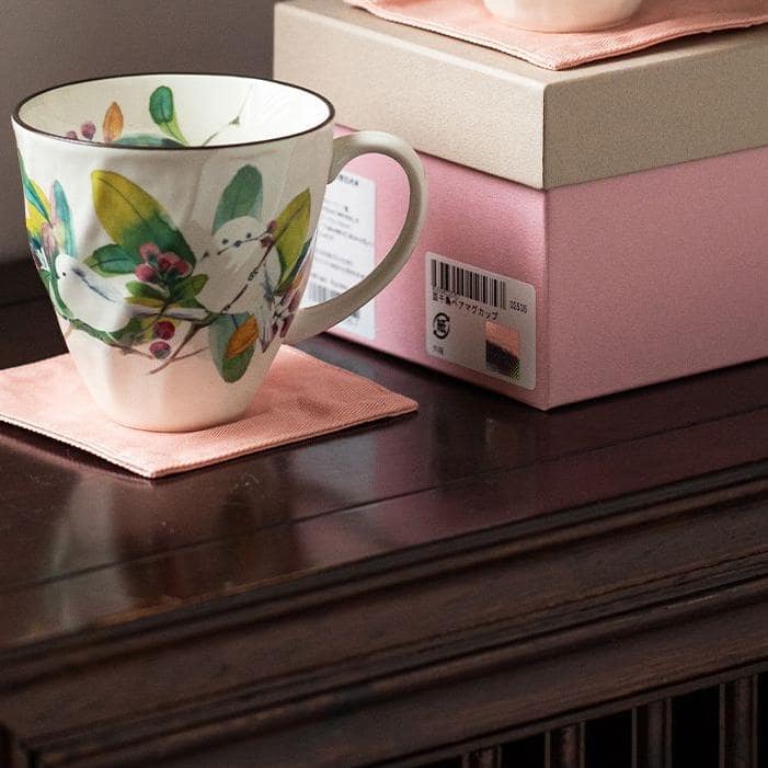 Porcelain tea mugs with vibrant floral patterns