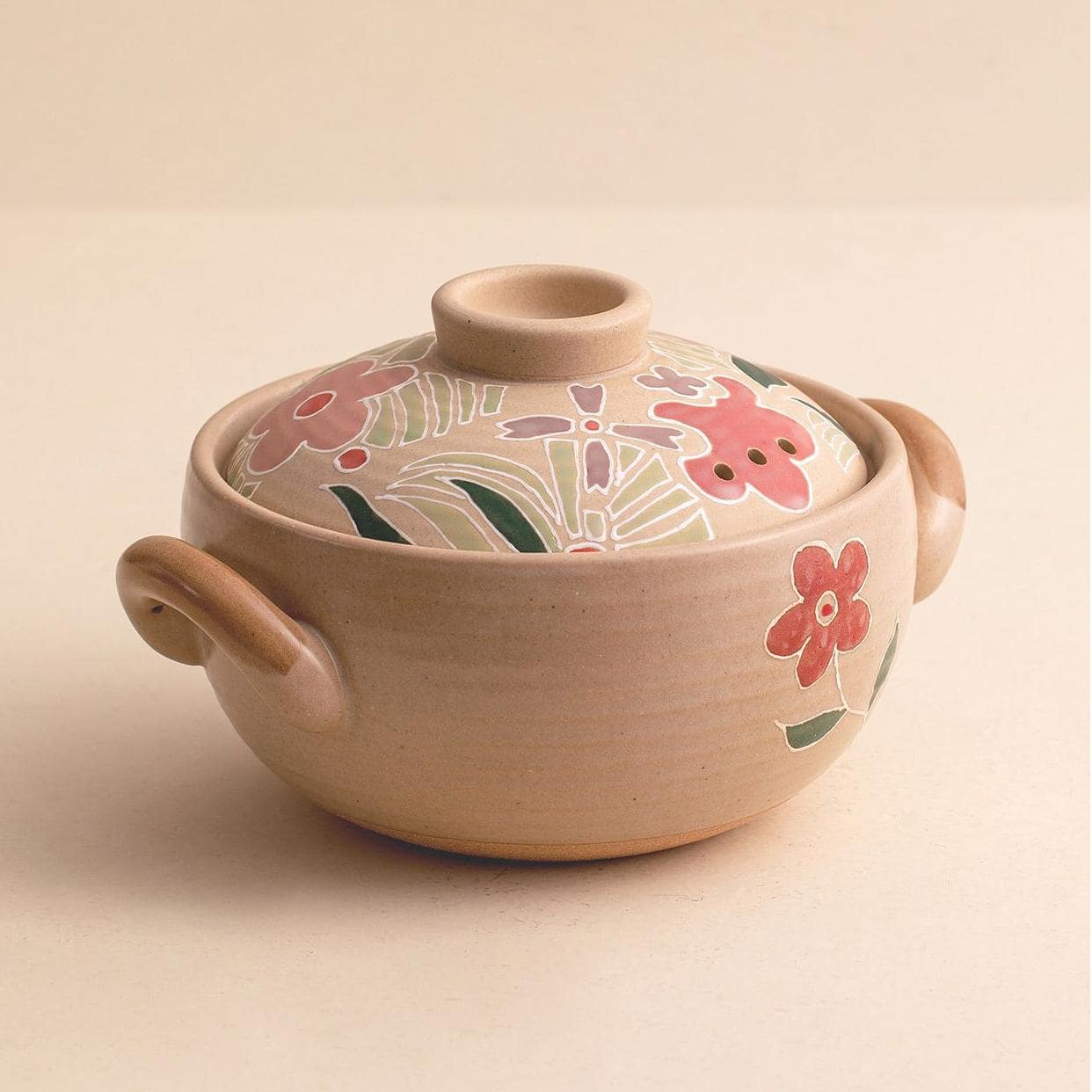 Handcrafted casserole pot with lid and charming design