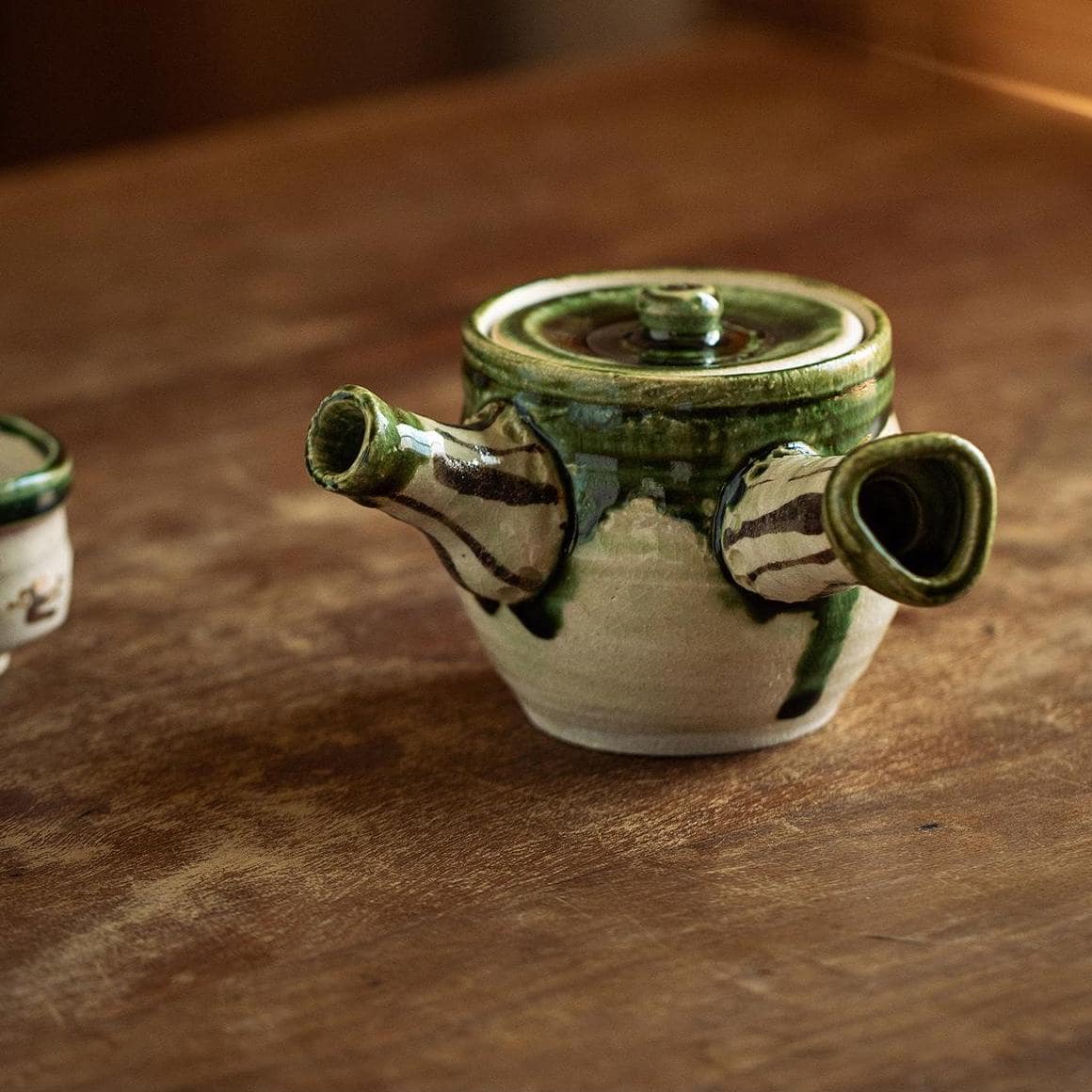 Top-down view of Japanese handmade ceramic Kyusu kettle.