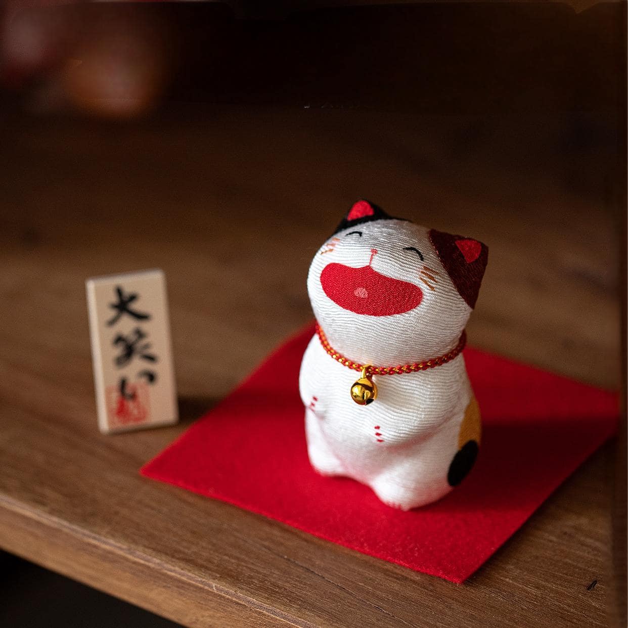 Collection of Japanese handcrafted fortune cat figurines