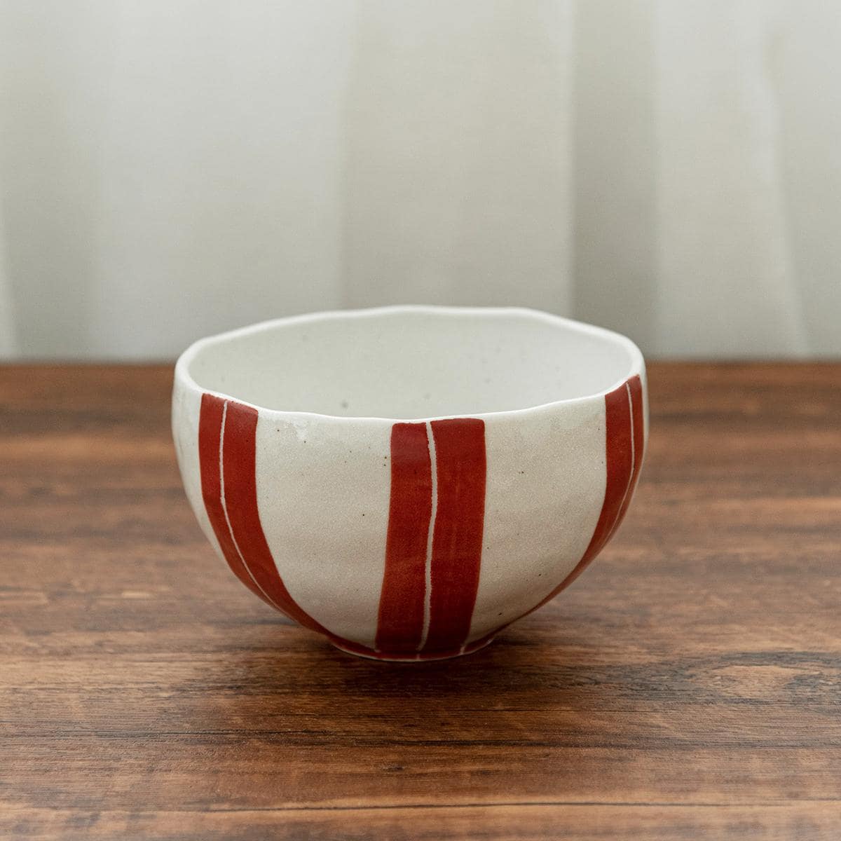 Red and black striped Japanese ceramic noodle bowls