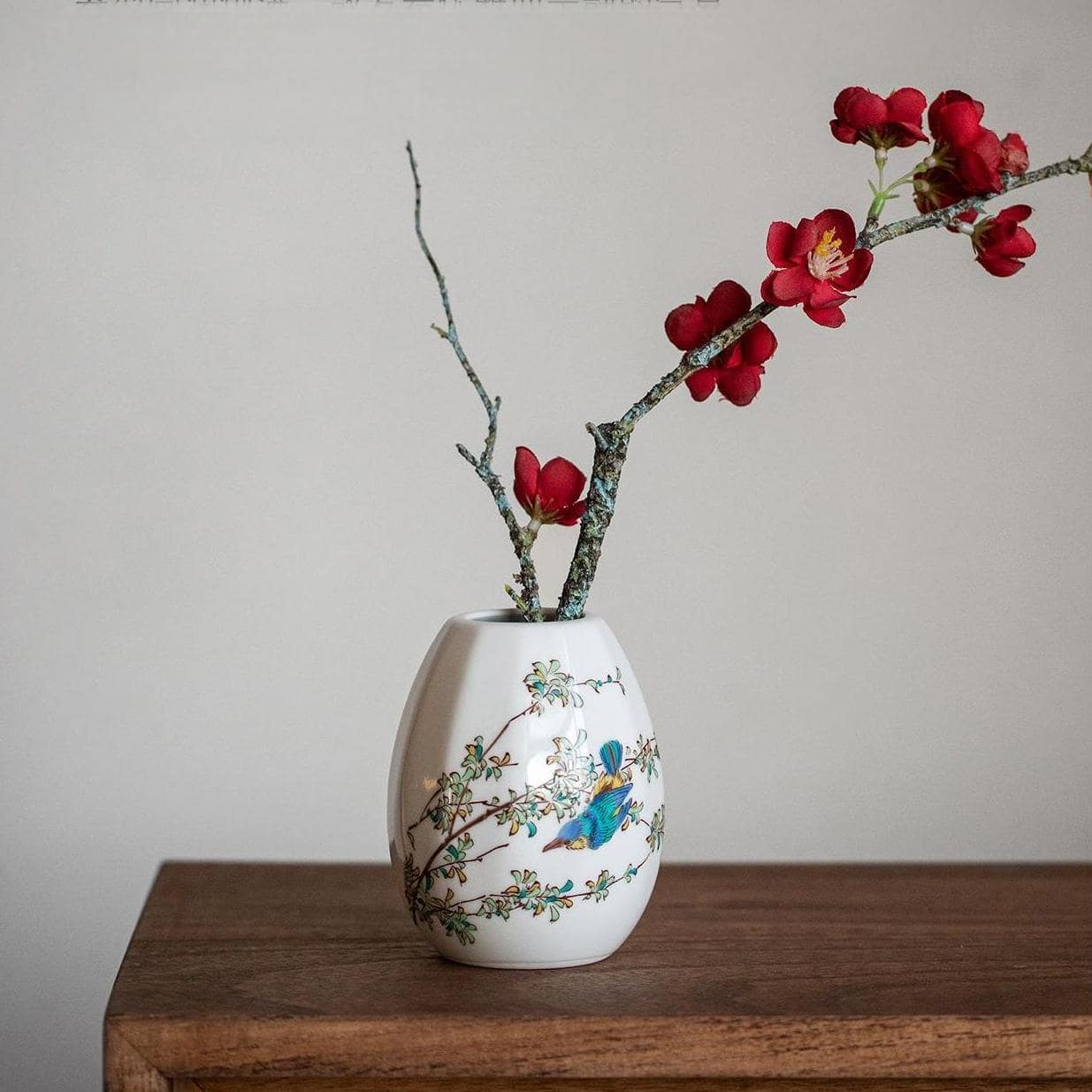 Elegant Japanese-style vase with bird and flower artwork for tabletop décor