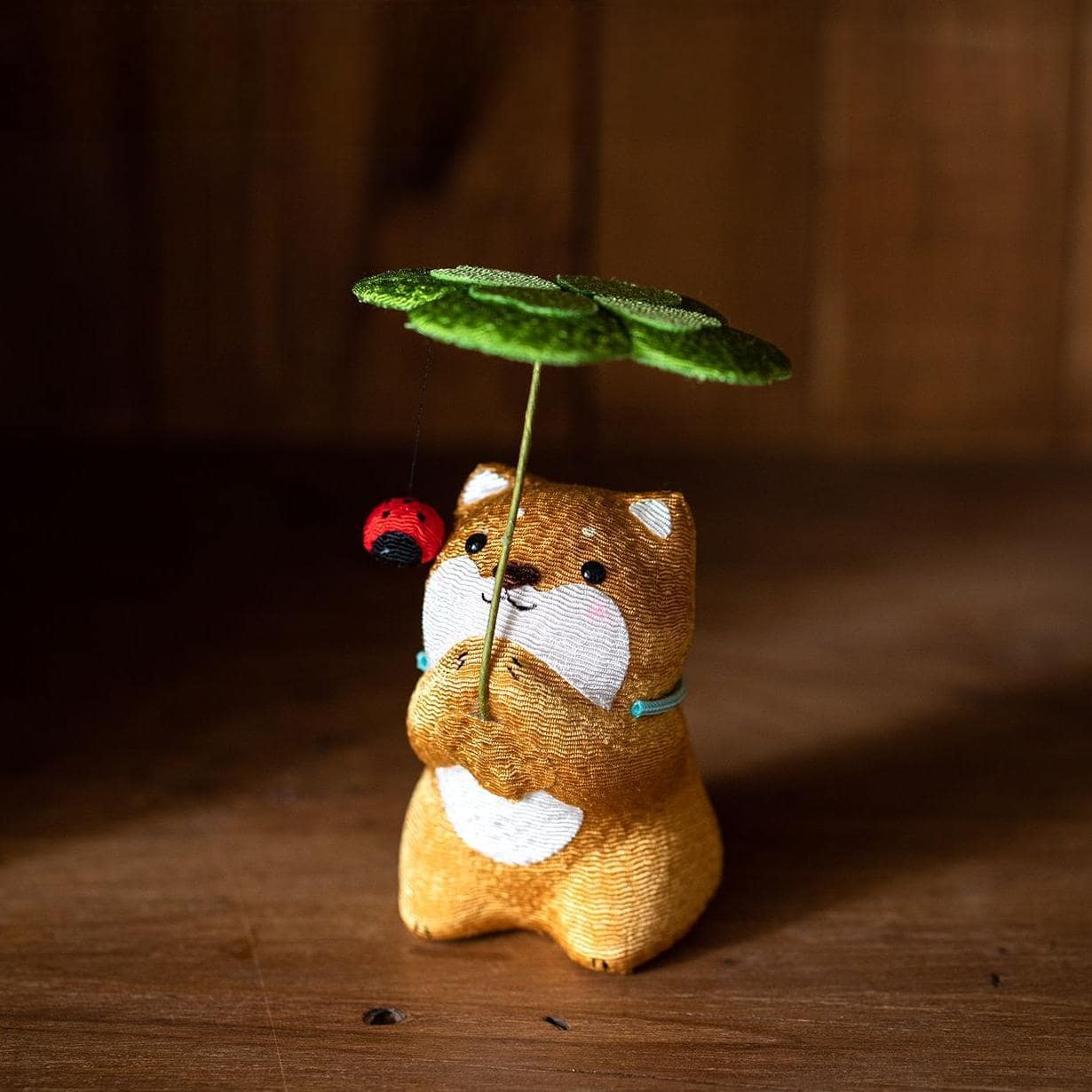 Close-up of a rabbit ornament with embroidered details.