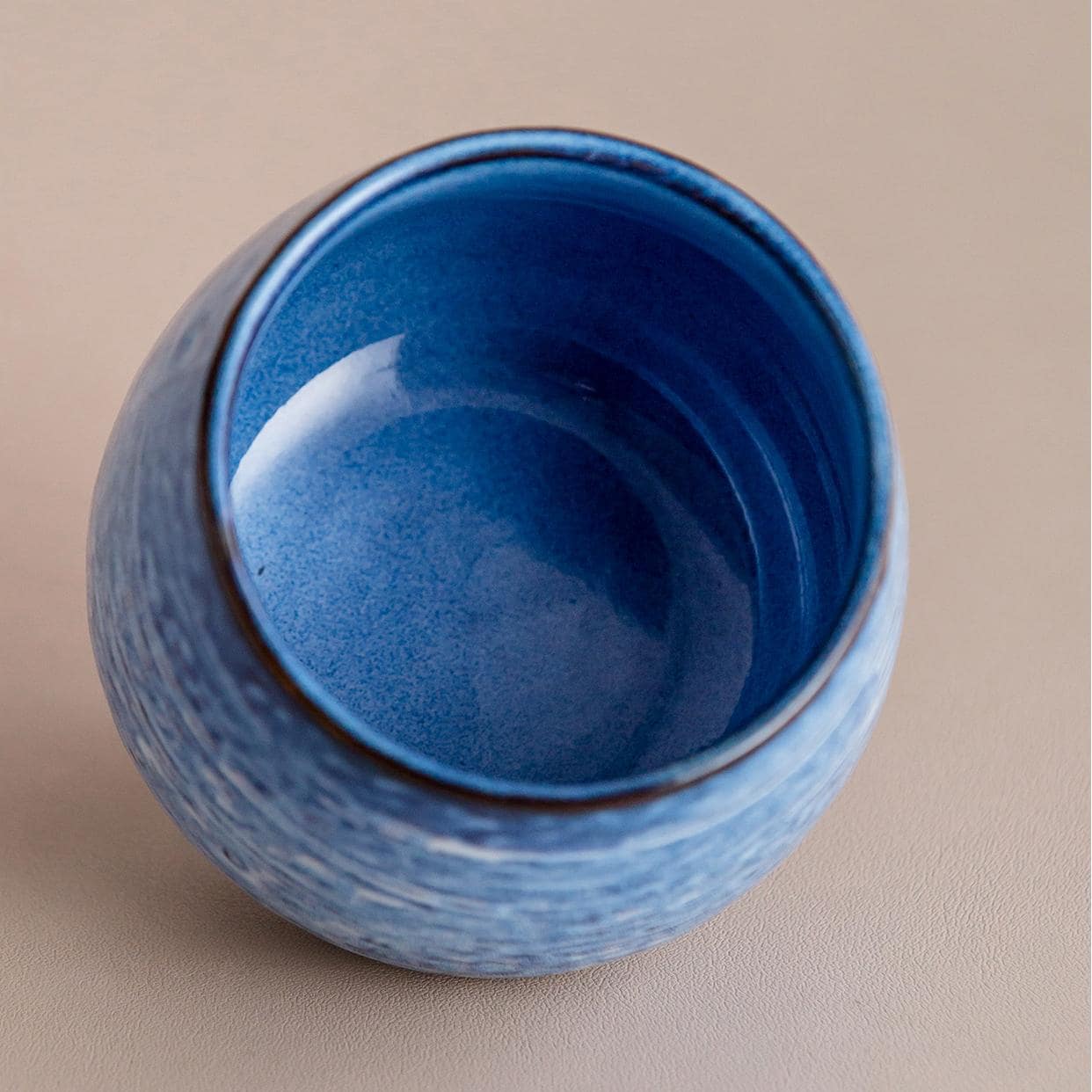 Beautiful lidded ceramic pots on a wooden table