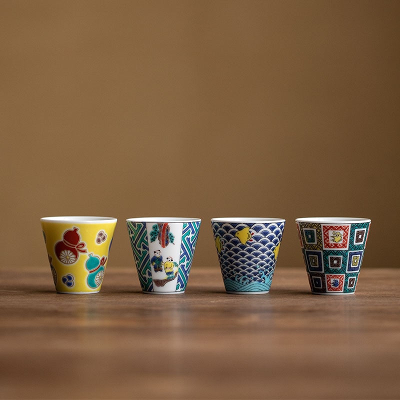 Set of Japanese porcelain cups with vibrant patterns