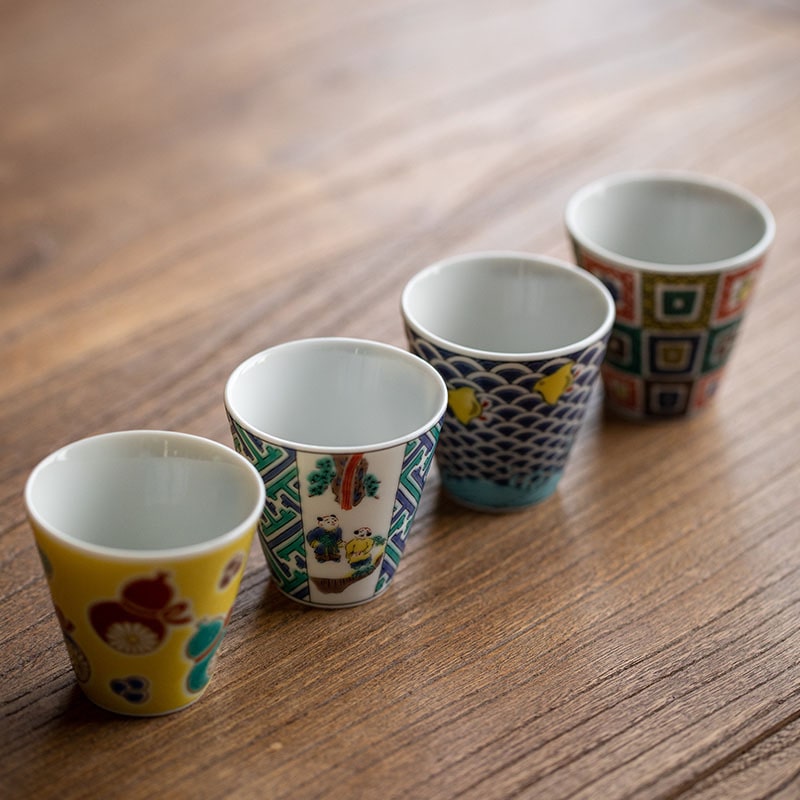 Close-up of a traditional Japanese sake cup with geometric design