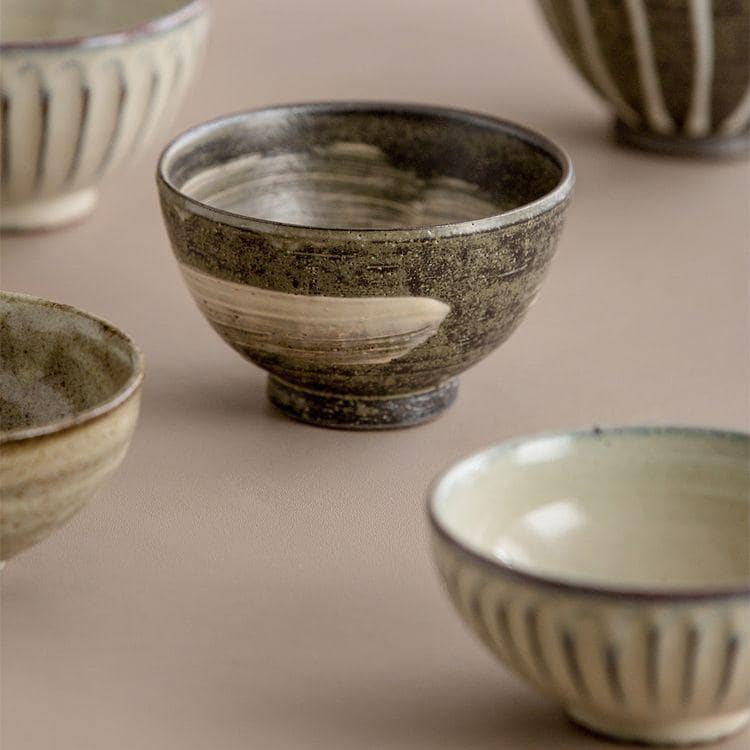 Eco-friendly ceramic bowls with timeless ribbed patterns