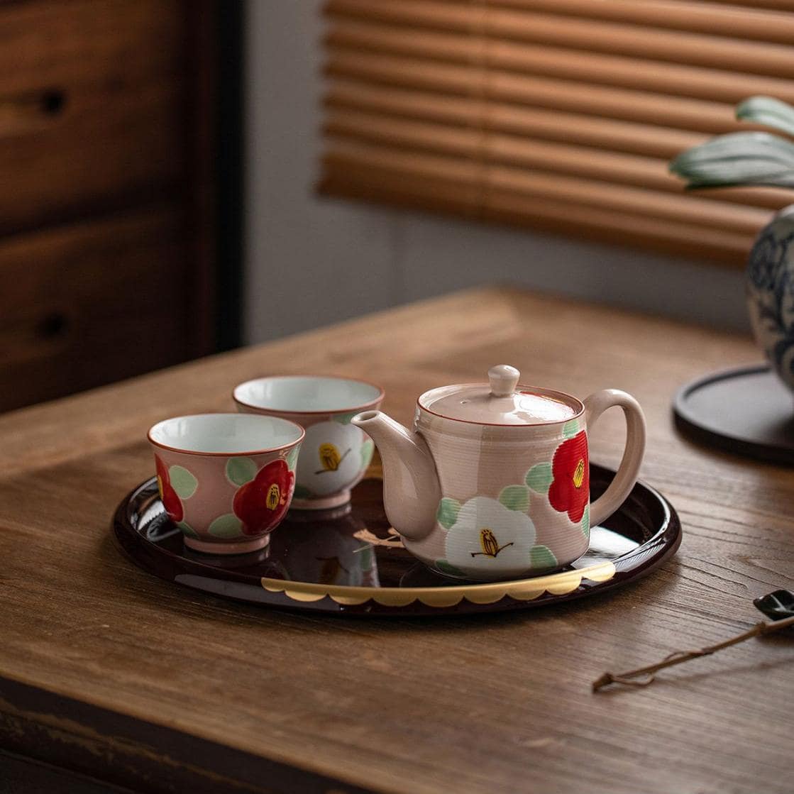 Traditional Japanese tea set in decorative wooden gift box.